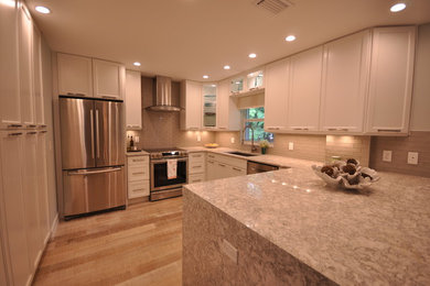 Example of a transitional kitchen design in Miami