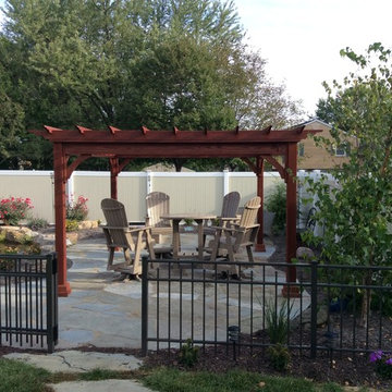 Traditional Wood Pergola with Signature Pond & Patio