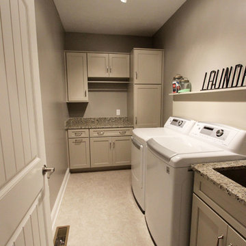 Laundry Room w/ Chai Latte Classic Paint Cabinets and Giallo Traversella Granite