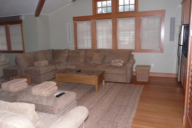Example of an arts and crafts family room design in Portland