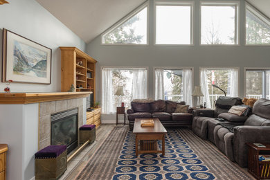 Example of a beach style home design design in Calgary