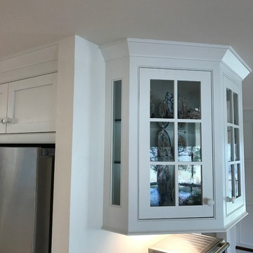 Kitchen with tiger maple and angled cabinets