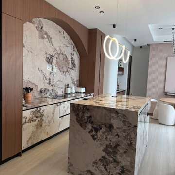 Luxury Gourmet Kitchen with Full Stone Island & Arch Splashback