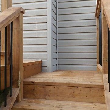 Second floor pressure treated deck with aluminum balusters