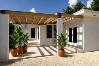 Mid-sized contemporary white one-story exterior home idea in Miami