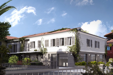 Esempio della facciata di un appartamento ampio bianco classico a un piano con rivestimenti misti e copertura in tegole