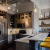 Gray Cabinets and a Wood-Wrapped Fireplace Update a Downtown Loft