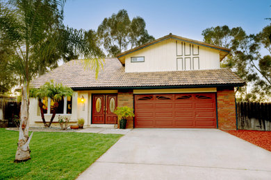 Example of a southwest home design design in San Diego