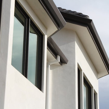6 inch Angle Face/Flat Face Gutters with smooth Downspouts in Pacific Palisades
