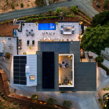 A little farm below a hillside resort-style off-the-grid view home