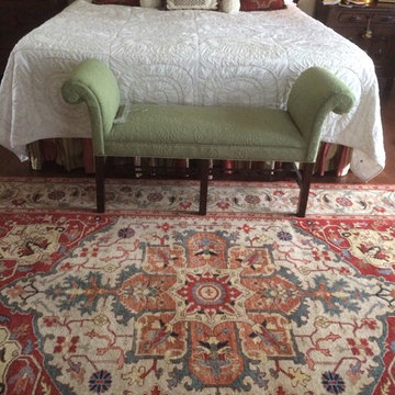 Serapi Oriental Rug grounds bedroom through elements of color and design!