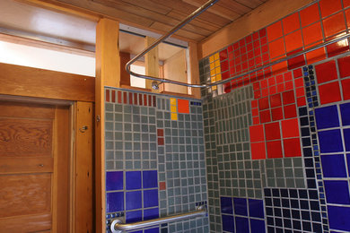 Bathroom - eclectic ceramic tile bathroom idea in Portland with a wall-mount sink