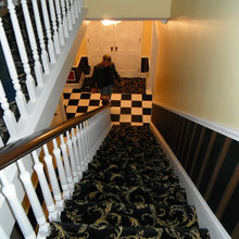 black and gold carpet on stairs