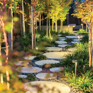 Inspiration for a large contemporary garden in Melbourne with concrete paving.