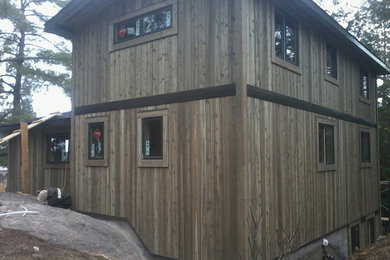 Inspiration for a wood exterior home remodel in Other