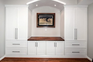 Inspiration for a mid-sized contemporary light wood floor kitchen/dining room combo remodel in DC Metro with beige walls and no fireplace