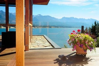 Mountain style patio photo in Calgary