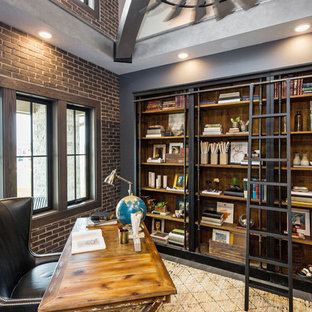 Medium sized industrial study in Other with grey walls, dark hardwood flooring, no fireplace, a freestanding desk and brown floors.