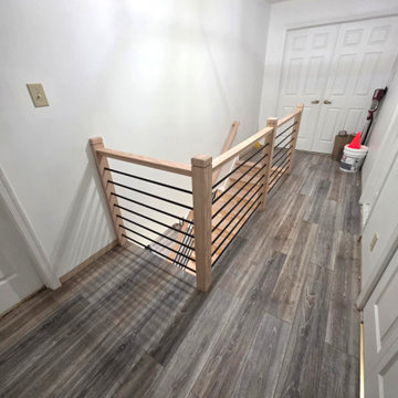 Horizontal Stair Railing with Red Oak T-Rail and Black Metal Bars