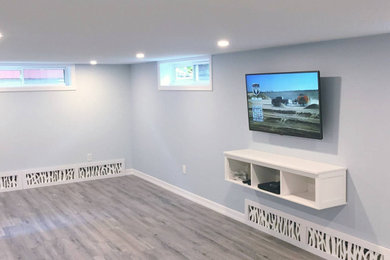 Minimalist basement photo in Toronto
