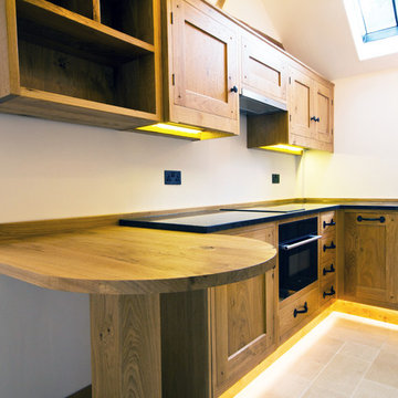 A Guesthouse With A Small Yet Beautiful Oak Kitchen And Cloakroom