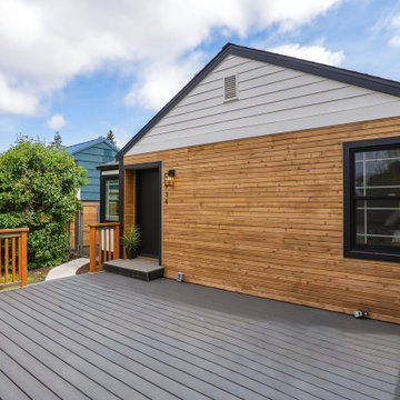 Cedar-Clad Entry Wall, Black Window and Composite Deck – Seattle Bungalow