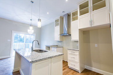 Arts and crafts kitchen photo in Other