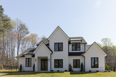 Inspiration for a french country exterior home remodel in Charlotte