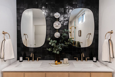 Inspiration for a mid-sized transitional master black tile double-sink bathroom remodel in Los Angeles with furniture-like cabinets and light wood cabinets