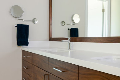 Mid-sized minimalist master ceramic tile and double-sink bathroom photo in San Francisco with flat-panel cabinets, dark wood cabinets, a two-piece toilet, an undermount sink, quartz countertops, a hinged shower door, white countertops and a built-in vanity