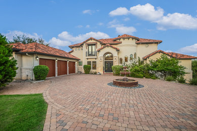 Inspiration for a mediterranean exterior home remodel in Austin
