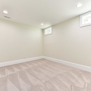 Inspiration for a medium sized classic walk-out basement in Other with beige walls, carpet and white floors.