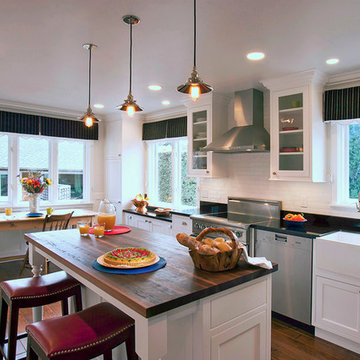 Large Traditional Kitchen with Wood Countertop Island