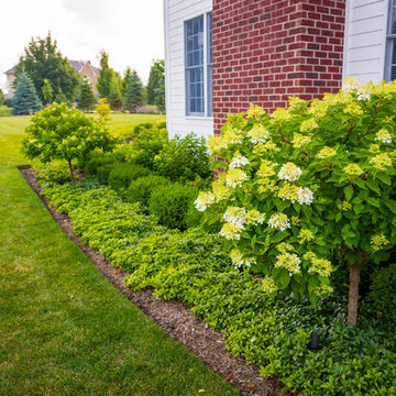 Entertain in this Backyard Landscape with Patio & Firepit: Perfect for Families!