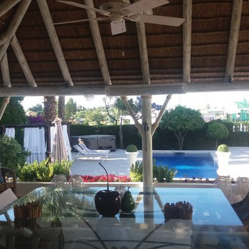 Thatched roof gazebo and pergola