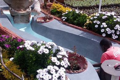 CASCADING STREAM AND WATER FOUNTAINS BY GOLDENSCAPE LANDSCAPE ARCHITECTS