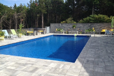 Example of a classic backyard pool design in New York