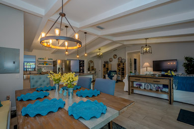 Inspiration for a mid-sized transitional ceramic tile and gray floor kitchen/dining room combo remodel in Miami with blue walls