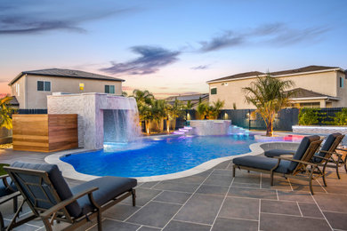Large beach style custom-shaped natural pool landscaping photo in San Francisco