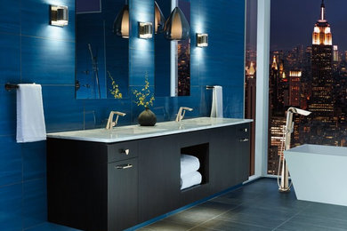 Freestanding bathtub - large modern master blue tile and ceramic tile porcelain tile freestanding bathtub idea in New York with blue walls