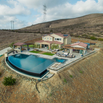 Gorgeous Infinity Pool with Multiple Outdoor Living Spaces