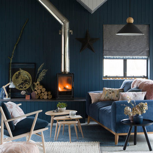Rustic living room in London with blue walls.