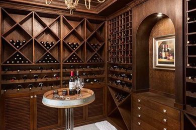 Example of a large transitional wine cellar design in Vancouver