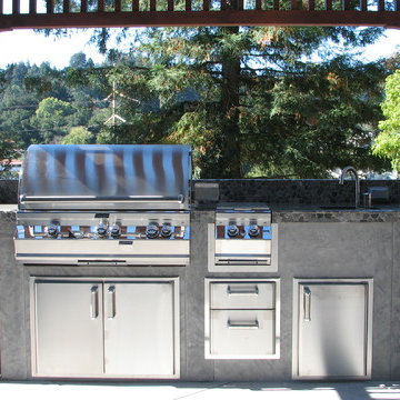 Outdoor Concrete Patio w/ Firepit, BBQ, Fountain & Bartop - The Germany Patio