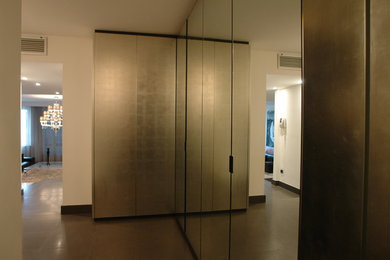 Mid-sized minimalist marble floor hallway photo in Milan with white walls