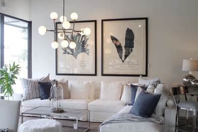 Example of a mid-sized beach style formal and open concept carpeted and brown floor living room design in Orlando with white walls
