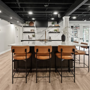 A Basement Built for Entertaining – With a Speakeasy Bar and Golf Simulator