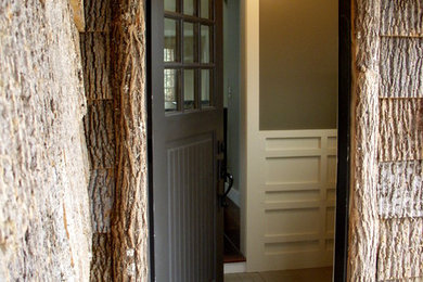 This is an example of an eclectic porch design in Charlotte.