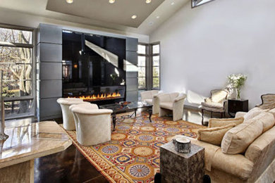 This is an example of a large contemporary open concept living room in Dallas with grey walls, concrete floors, a ribbon fireplace, a tile fireplace surround and brown floor.