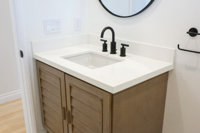 Minimalist yellow tile and ceramic tile ceramic tile and white floor bathroom photo in Los Angeles with white walls, marble countertops and white countertops